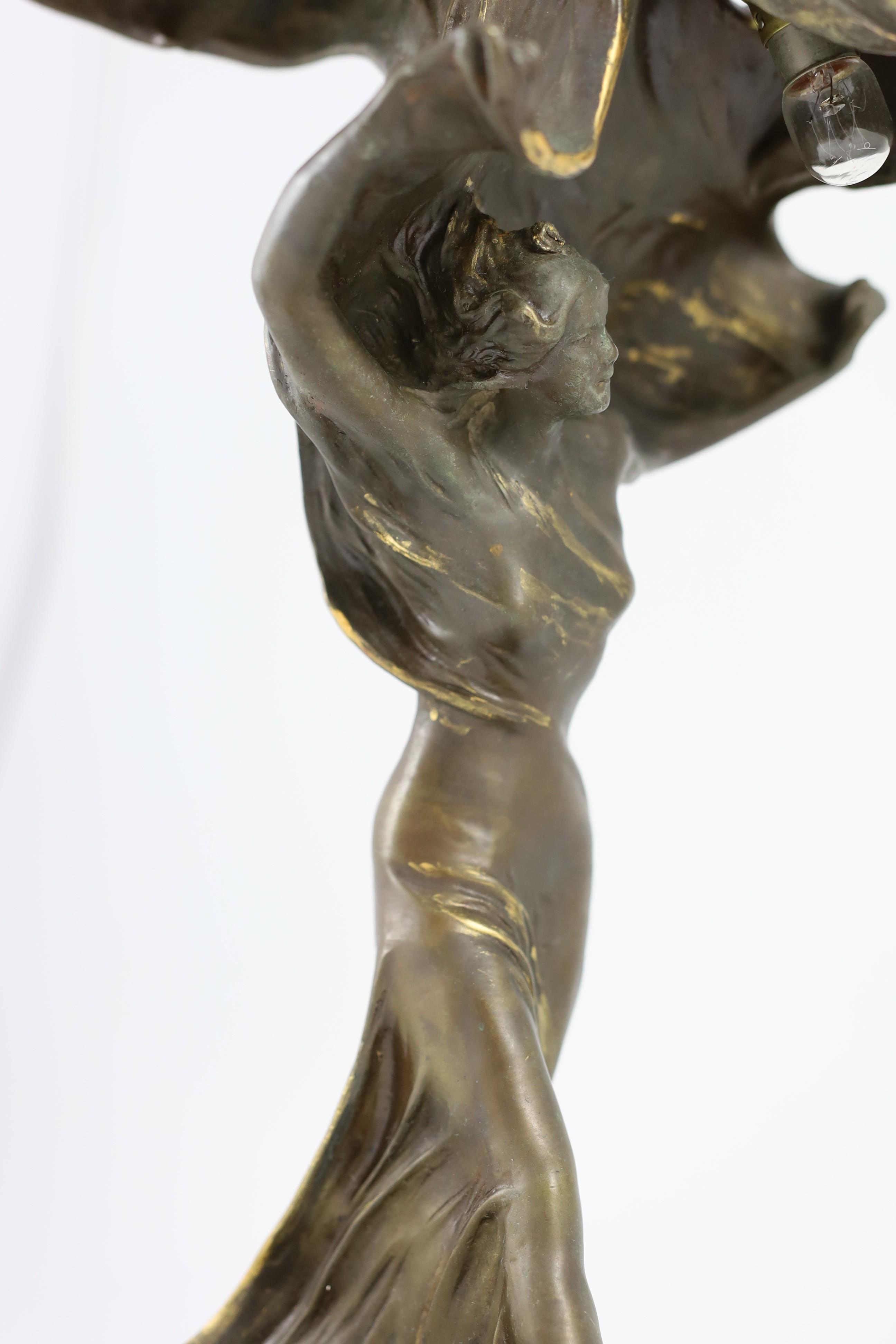 After Raoul Larche (1860-1912). A bronze 'Loie Fuller' table lamp, height 43cm